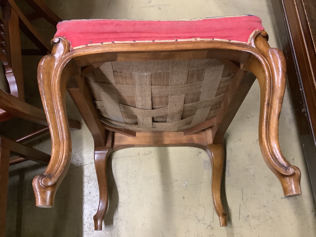 A Victorian mahogany dressing stool with needlework top, on cabriole legs, width 66cm